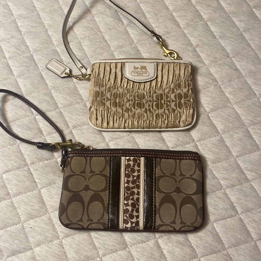 Two coach wristlets